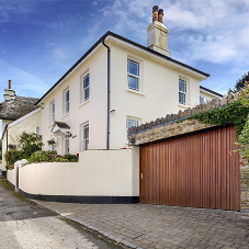 Why the door style will enhance or limit a garage’s functionality