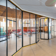 Striking steel door screen and matching window for Church renovation