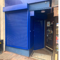 Perforated Security Shutters at Herbs Plus, Beckenham High Street