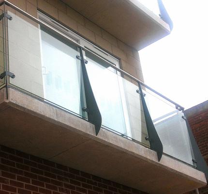 Balcony balustrades with toughened glass infill panels
