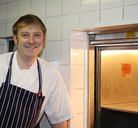 Head Chef at The Grange Hotel, James Brown, seen with a Stannah Microlift