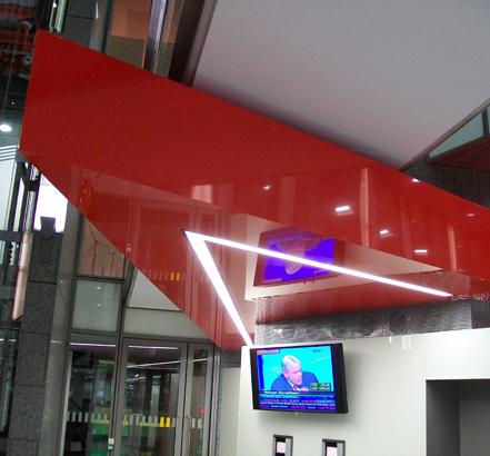 Stretch Ceilings Red floating triangle, installed at HSBC in Dublin