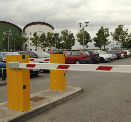 The barriers allow entry by card readers and automatic exit by underground loop
