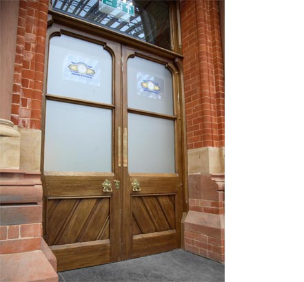 The huge solid-oak doors to the booking office now feature modern door springs and electro-magnetic closers