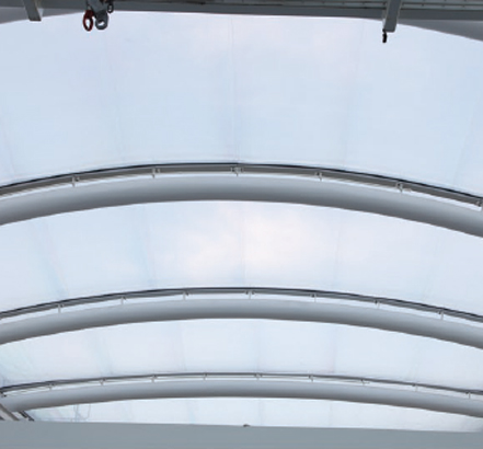 The curved geometry of the roof meant that each ETFE pillow, steel member and profile detail was designed individually