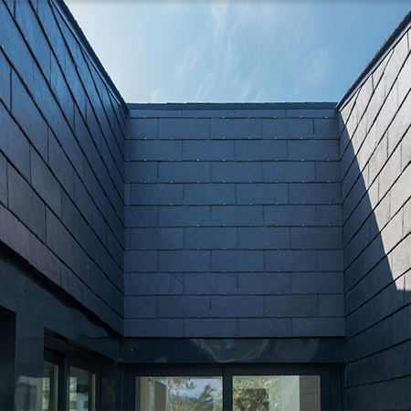 Natural slate rainscreen cladding for showroom