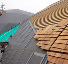 Two of the Pods are finished with individually laid shingle tiles