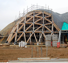 The entrance Pod showing membrane and profile, prior to being finished with glazed aluminium