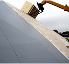 Insulation being installed at pitches of up to 40 degrees