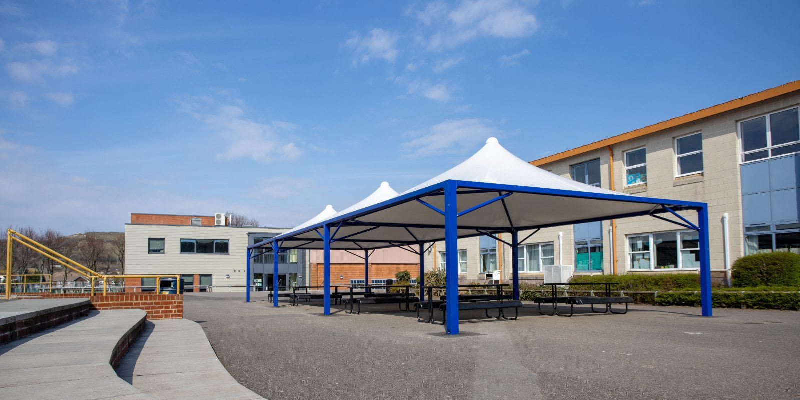 The Harvey Grammar School in Kent Add White Fabric Tepee Canopies